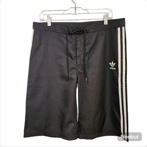 NWOT adidas black with side white stripes swimmers board shorts men size M US